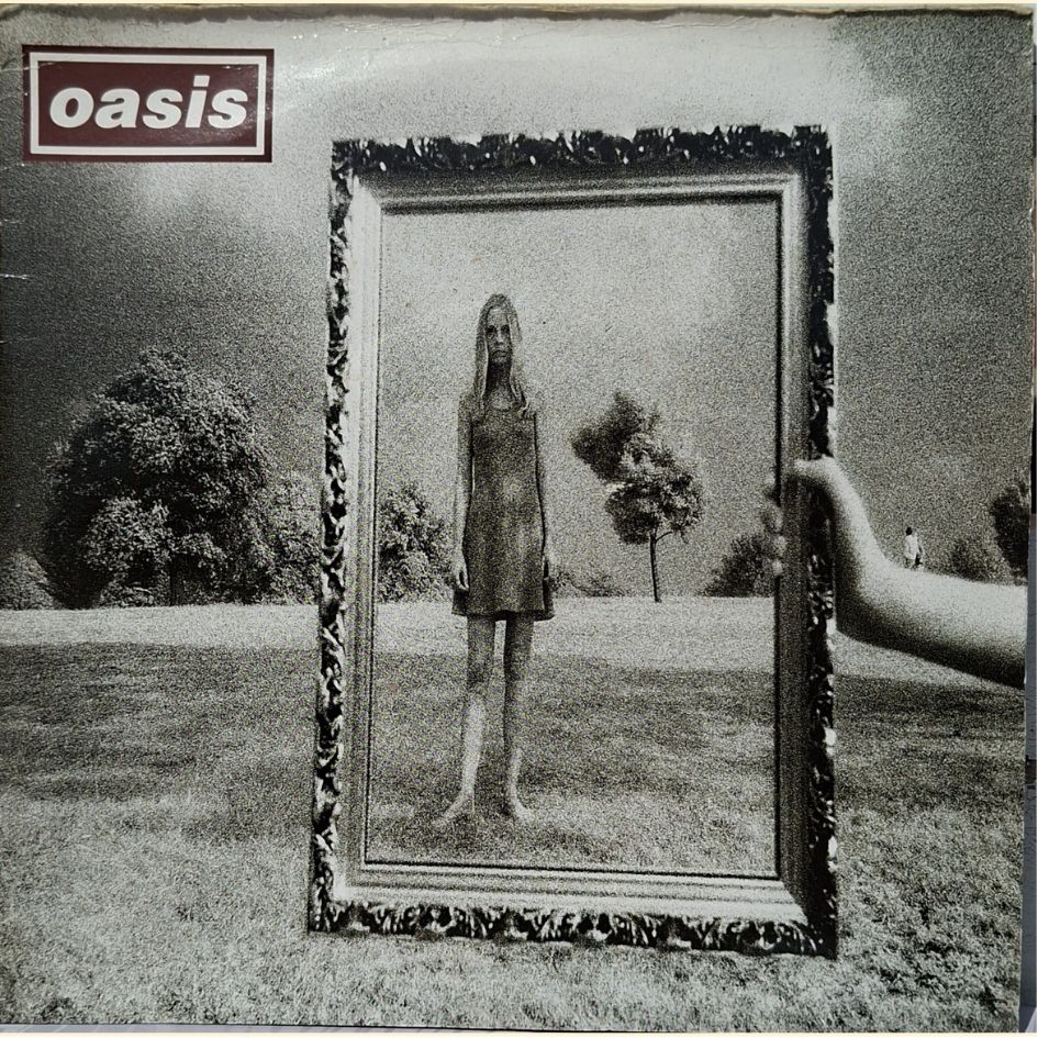 Oasis: Wonderwall 7" Vinyl Record CRE 215